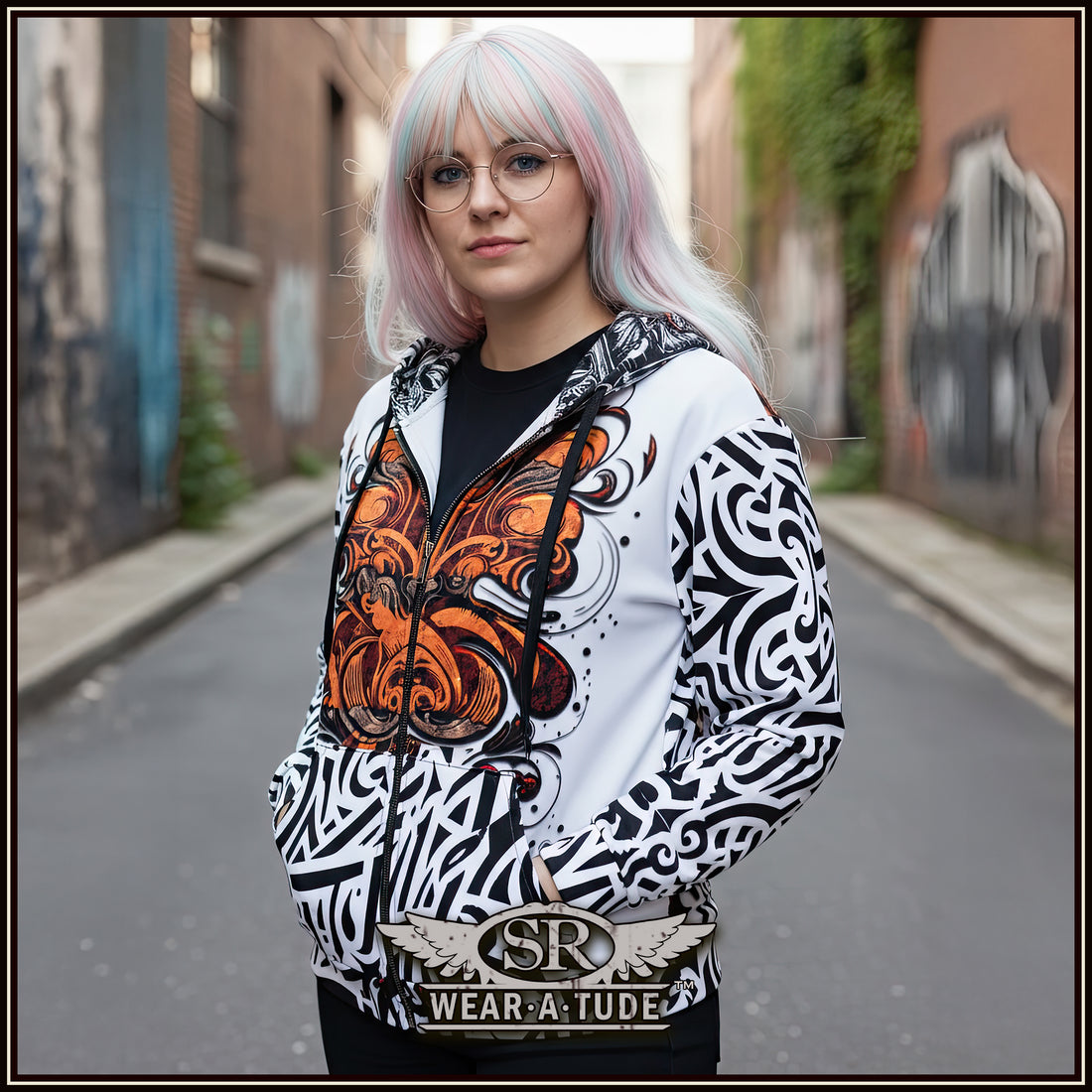 Santa Rebelde zipper hoodie. Bold black and white print hinting at a Chicano style with a abstract rust orange chest print 