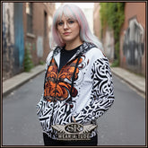 Santa Rebelde zipper hoodie. Bold black and white print hinting at a Chicano style with a abstract rust orange chest print 