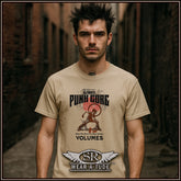 Man wearing a beige t-shirt with graphic design and text in an urban setting 