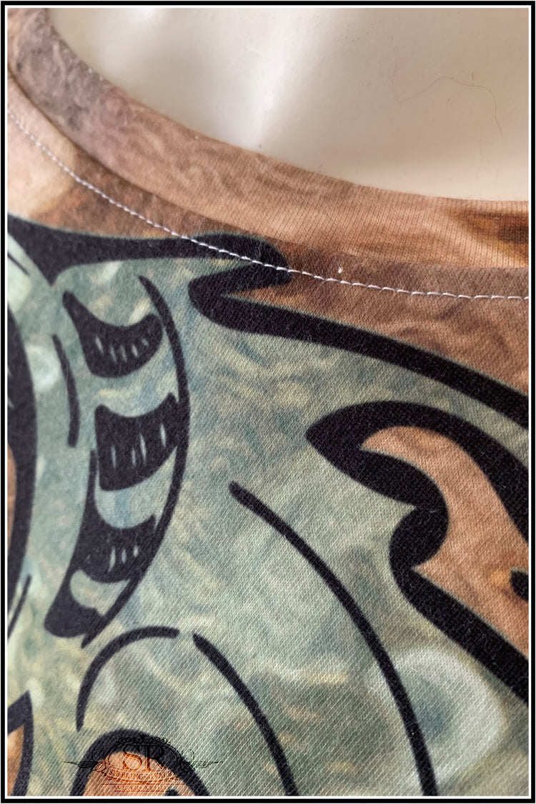 Detail of the stitching around the neck of the shirt