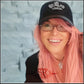 Jube from Pisskies, with pink hair wearing the Winged harmonica ball capWinged Harmonica ball cap, Blues player hat, Quality embroidery design 