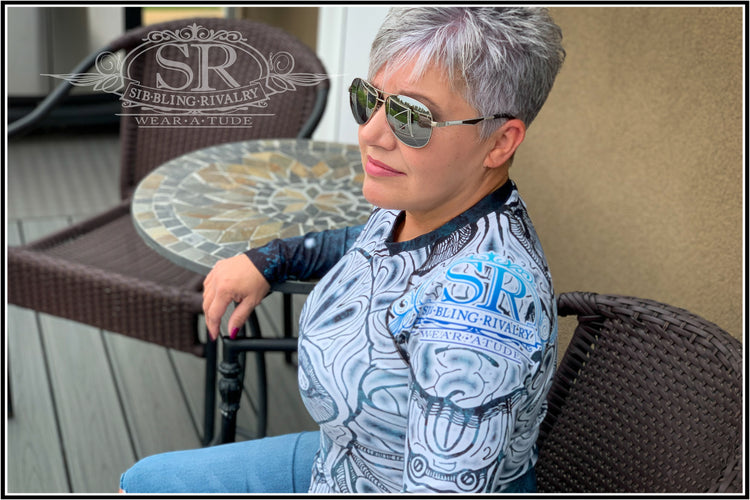 Our sexy model is wearing SUGAR & SNOW ~ SR Rash Guard - SIB.BLING RIVALRYWear A Tude clothing by SibBling Rivalry Design. Our striking Sugar Skull design on a form fitting sports shirt. 